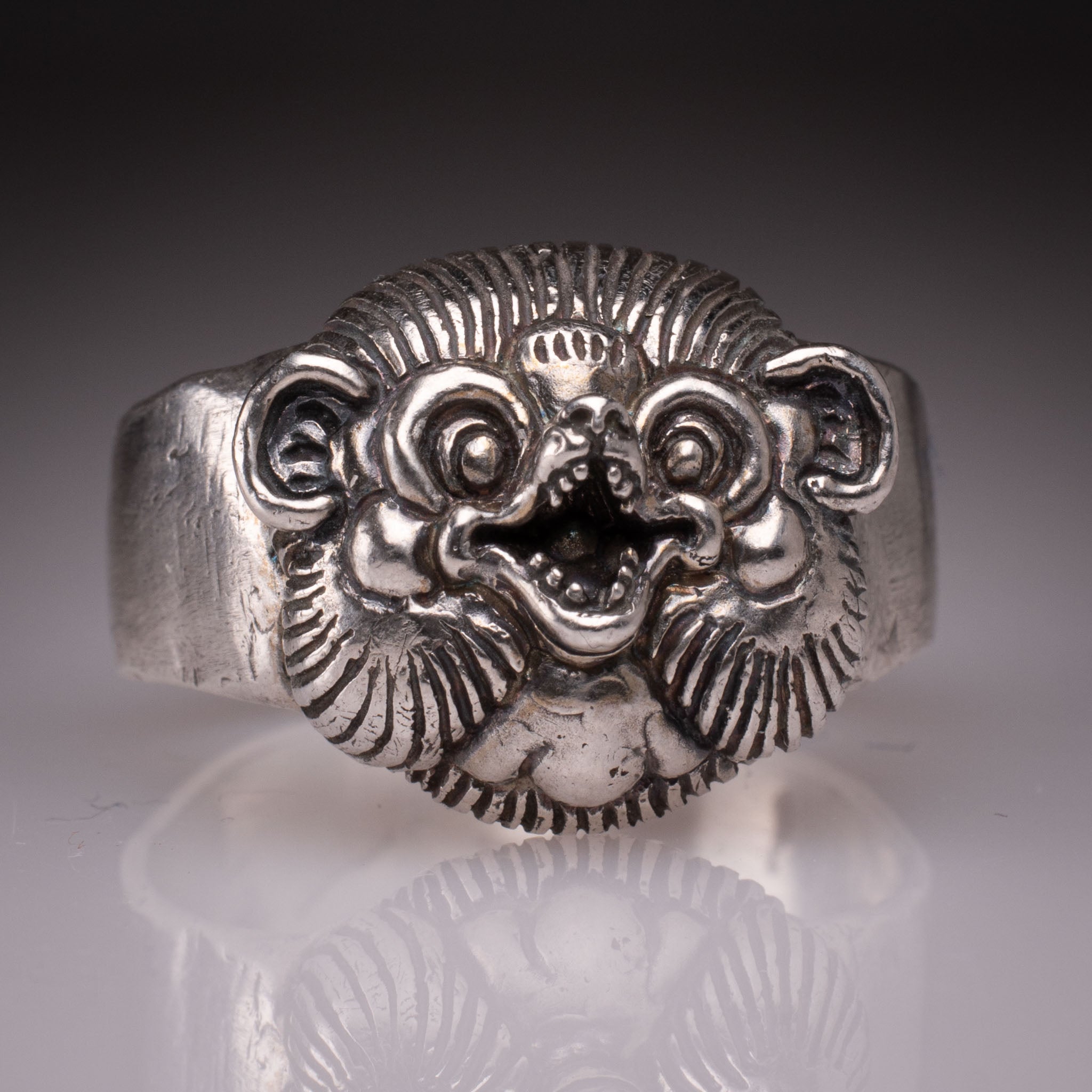 Handcrafted 925 silver Tanuki Mask Ring showing the intricate facial features and tattoo-inspired details designed by David Saez for KaijuLab.